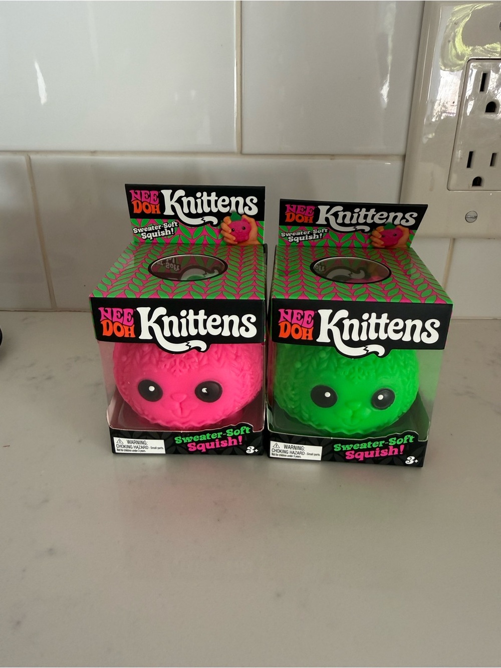 NeeDoh Knittens Sweater-Soft Squish - Pink & Green. Set of 2.